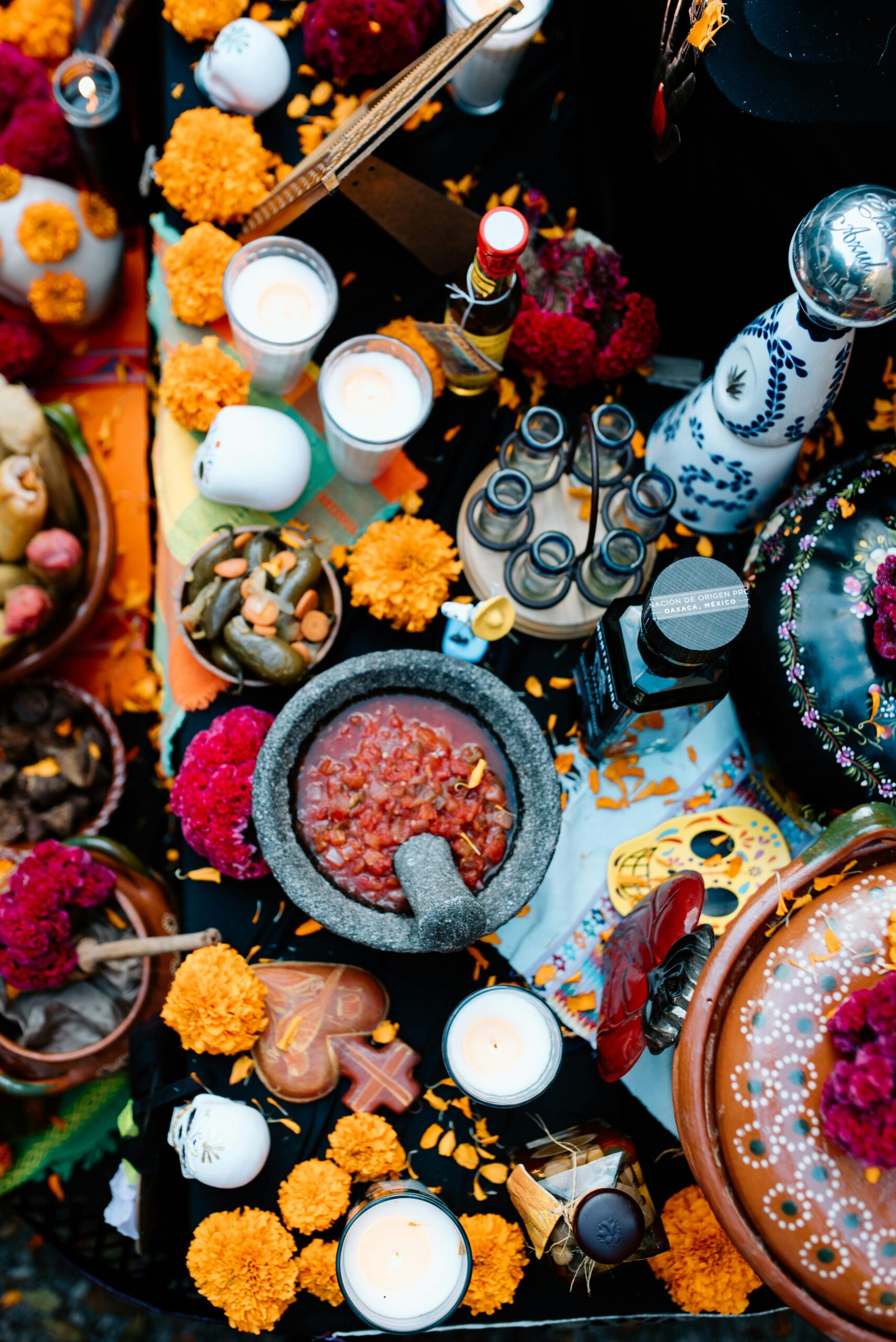 Featured image for Day of the Dead: altar with marigolds, candles, and sugar skulls.